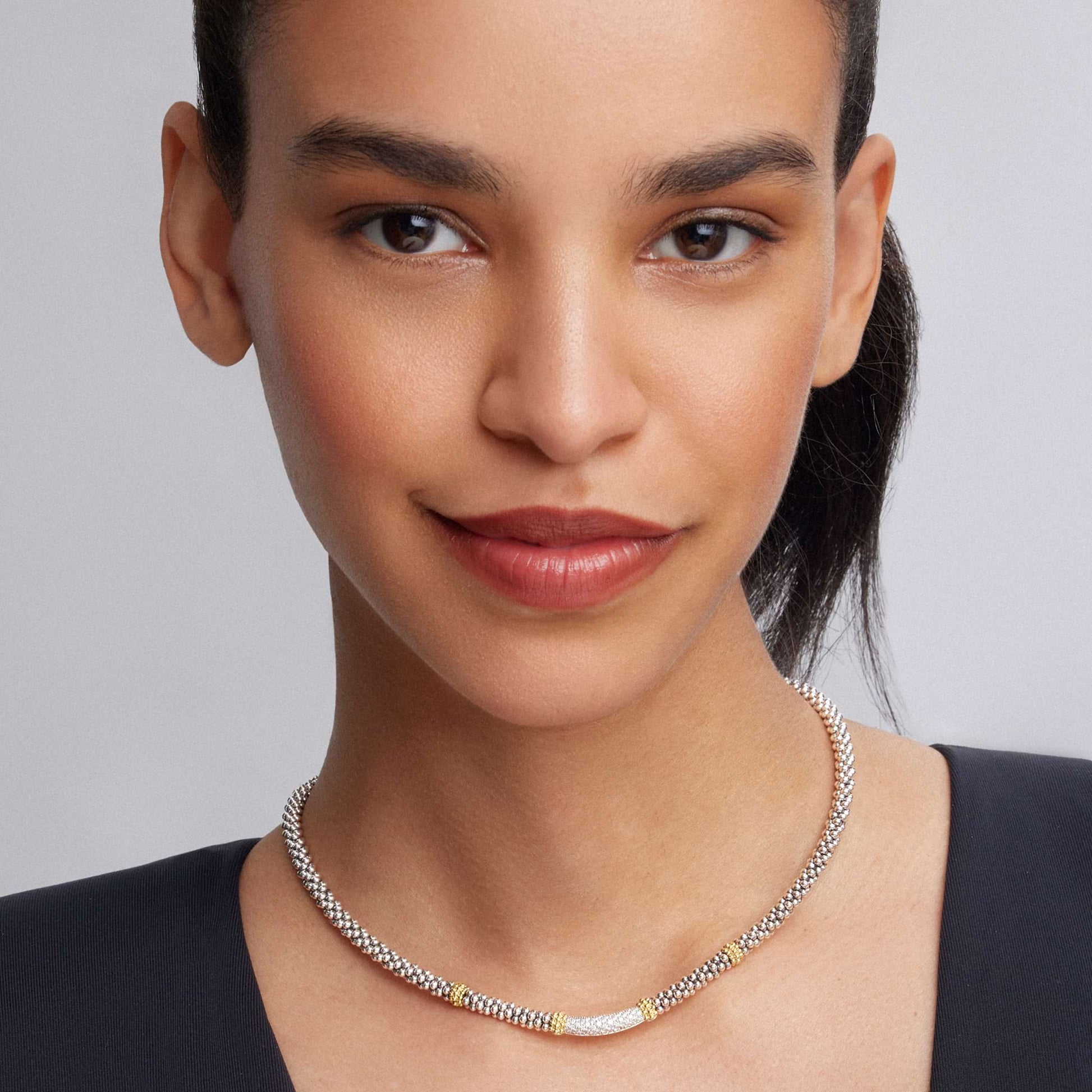 A 3 mm sterling silver Caviar-rope necklace by LAGOS, featuring a pavé diamond station accented with 18K gold beads; total diamond weight approx. 0.24 ct, perfect for refined everyday elegance-1