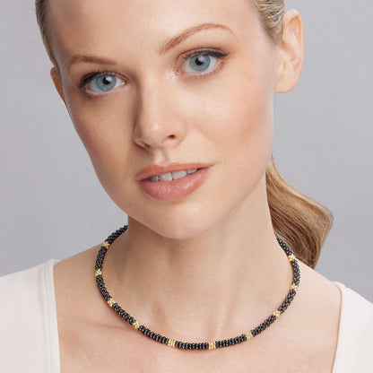 A refined Lignora Black Caviar necklace featuring twelve 18K gold small stations interspersed with black ceramic Caviar beads on a sterling silver rope, around 5 mm in width, 16″‑18″ length, secured with an 18K gold lobster clasp-3