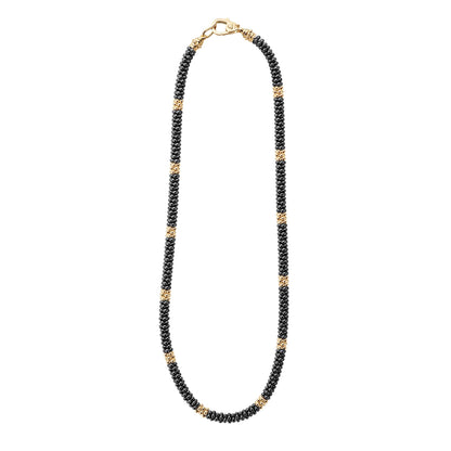 A refined Lignora Black Caviar necklace featuring twelve 18K gold small stations interspersed with black ceramic Caviar beads on a sterling silver rope, around 5 mm in width, 16″‑18″ length, secured with an 18K gold lobster clasp-4