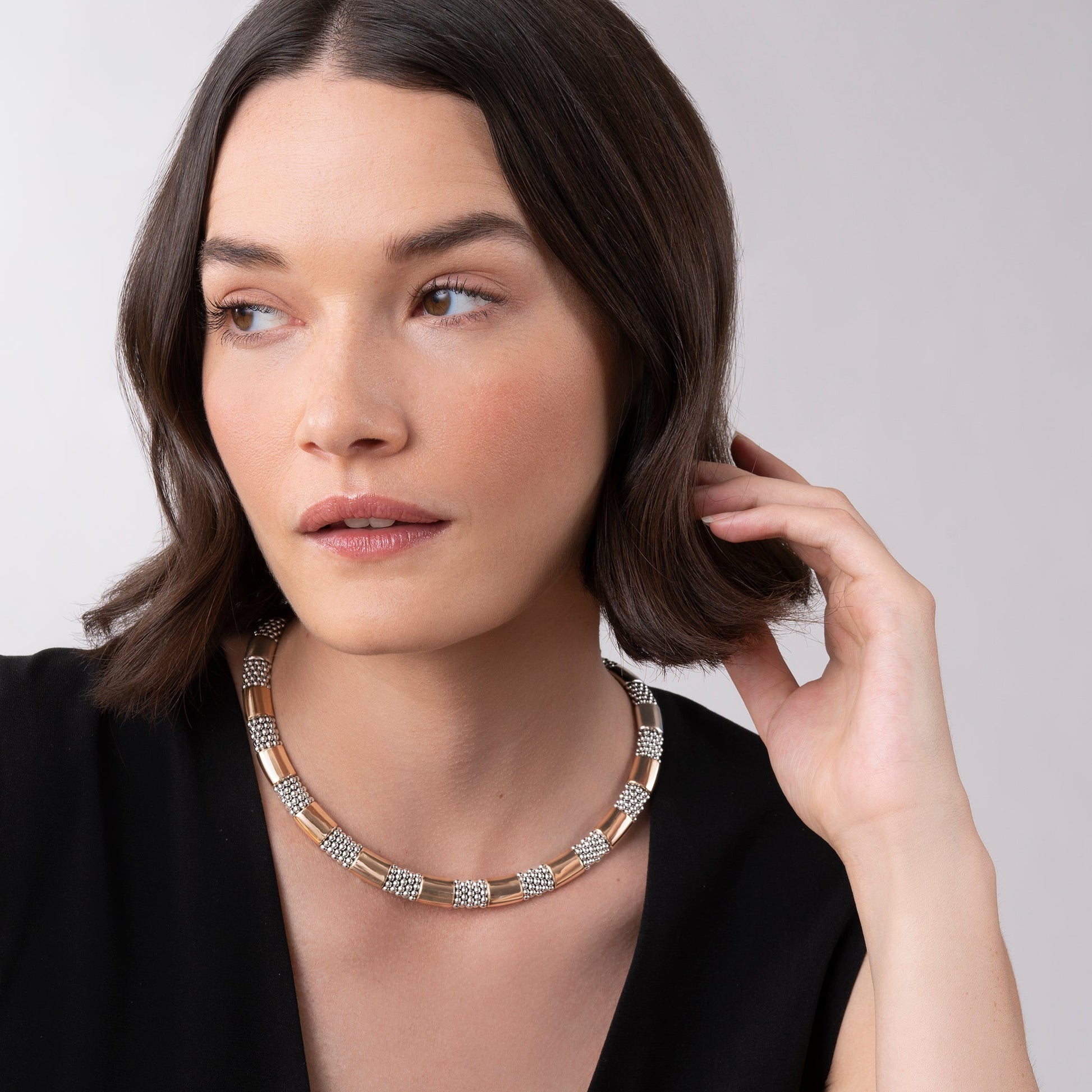 A luxurious 5 mm Lignora High Bar rose gold station Caviar necklace featuring six smooth 18K rose gold stations set into sterling silver rope with signature Caviar beading versatile and elegant for both day and evening wear-4