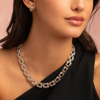 A two-tone Lignora High Bar Caviar link necklace featuring alternating sterling silver and 18K gold Caviar‑beaded links in a 22 mm width, secured by a double-button box clasp an elegant statement piece mixing silver and gold tones-4