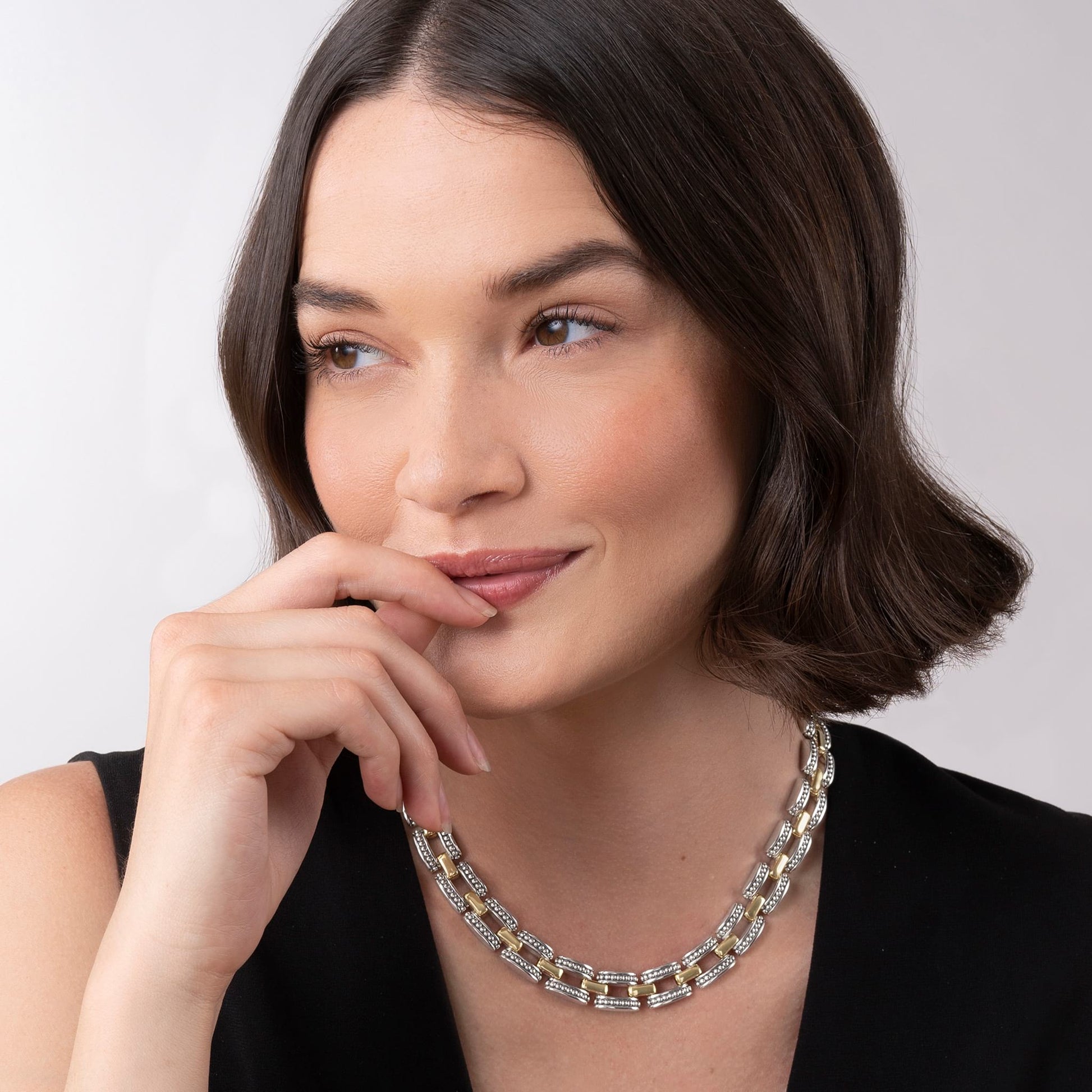 A two-tone Lignora High Bar Caviar link necklace featuring alternating sterling silver and 18K gold Caviar‑beaded links in a 22 mm width, secured by a double-button box clasp an elegant statement piece mixing silver and gold tones-6