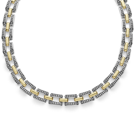 A two-tone Lignora High Bar Caviar link necklace featuring alternating sterling silver and 18K gold Caviar‑beaded links in a 22 mm width, secured by a double-button box clasp an elegant statement piece mixing silver and gold tones